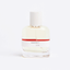 max fragrance bottle with orange stripe on label 